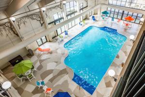 an overhead view of a large swimming pool in a building at Lodge of the Ozarks in Branson