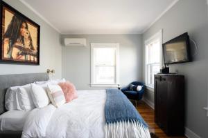 Llit o llits en una habitació de Nest Hudson