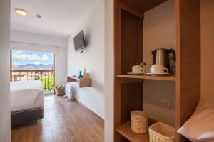 Kemudahan buat kopi dan teh di Muru Homely Hotel Cusco