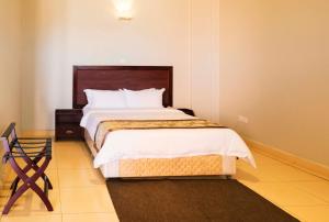Postelja oz. postelje v sobi nastanitve Easy View Hotel Mbarara