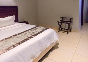 Postelja oz. postelje v sobi nastanitve Easy View Hotel Mbarara
