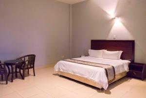 Postelja oz. postelje v sobi nastanitve Easy View Hotel Mbarara