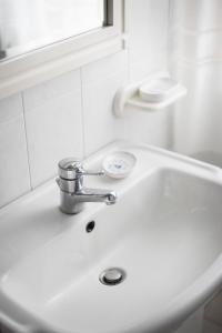 A bathroom at Apartment Helios