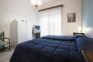 A bed or beds in a room at Apartment Helios