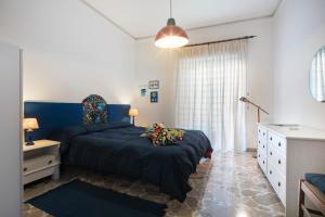 A bed or beds in a room at Apartment Helios