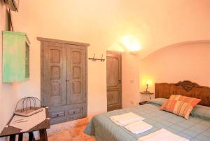 Katil atau katil-katil dalam bilik di Casa Vacanze Riposo Del Vento