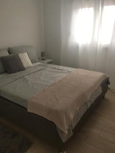 Postel nebo postele na pokoji v ubytování Luxury Apartments Vučinić Pirovac