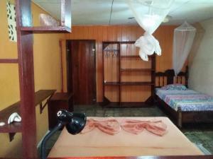 Ένα ή περισσότερα κρεβάτια σε δωμάτιο στο Cabinas Algebra