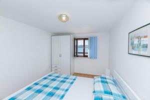 Postel nebo postele na pokoji v ubytování Apartment Island Dream