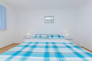 Postel nebo postele na pokoji v ubytování Apartment Island Dream