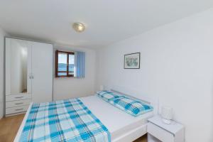 Postel nebo postele na pokoji v ubytování Apartment Island Dream