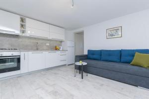 Kuchyň nebo kuchyňský kout v ubytování Apartment Island Dream
