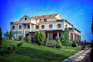 Vonkajšia záhrada v ubytovaní Hotel Aria