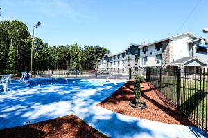 The swimming pool at or close to Super 8 by Wyndham Villa Rica