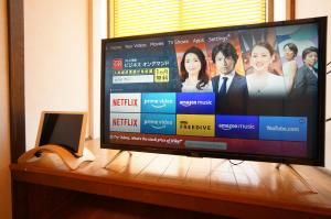 A television and/or entertainment centre at Rainbow Takayama Private House