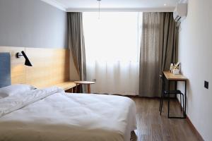 Postel nebo postele na pokoji v ubytování Travel light hostel