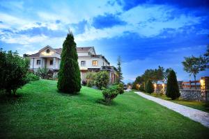 Vonkajšia záhrada v ubytovaní Hotel Aria