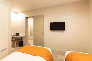 TV a/nebo společenská místnost v ubytování SARASA HOTEL Dotonbori + 37 fotografií