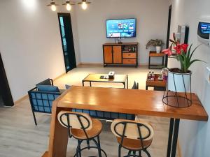 A television and/or entertainment centre at A&G Apartment
