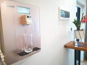 A kitchen or kitchenette at A&G Apartment