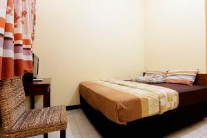 Letto o letti in una camera di JJ House Gejayan