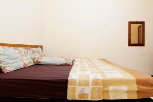 Letto o letti in una camera di JJ House Gejayan