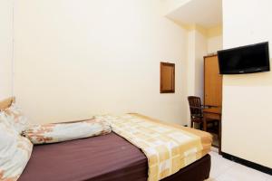 Letto o letti in una camera di JJ House Gejayan