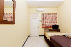 Letto o letti in una camera di JJ House Gejayan