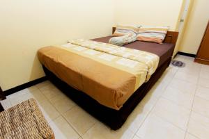 Letto o letti in una camera di JJ House Gejayan