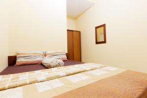 Letto o letti in una camera di JJ House Gejayan