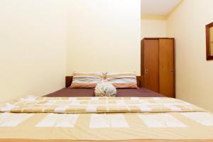 Letto o letti in una camera di JJ House Gejayan