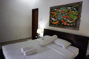 Postel nebo postele na pokoji v ubytování Ary Guest House