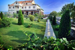 Vonkajšia záhrada v ubytovaní Hotel Aria