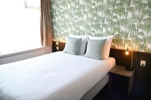 Voodi või voodid majutusasutuse Hotel Sebel toas