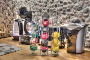 a group of glass bottles sitting on top of a table at Le Skidoux in LʼHuez