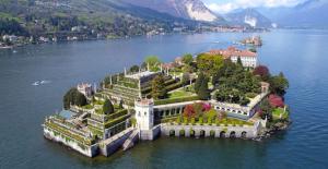 an island in the middle of a large body of water at Antico Palazzo Lago Maggiore in Verbania