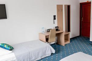 Postel nebo postele na pokoji v ubytování Janda Resort & Conference