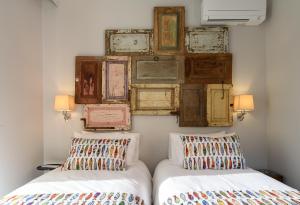 Sitio dos Cavaleiros Apartments tesisinde bir odada yatak veya yataklar