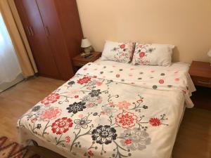 Ένα ή περισσότερα κρεβάτια σε δωμάτιο στο Apartment S&T