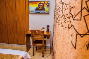 TV a/nebo společenská místnost v ubytování Grand Winston Hotel