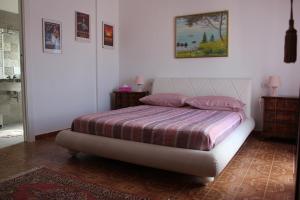 Postel nebo postele na pokoji v ubytování odeon rooms