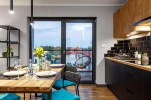 Kuchyň nebo kuchyňský kout v ubytování Apartament Gardenia No.1