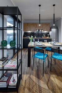 Kuchyň nebo kuchyňský kout v ubytování Apartament Gardenia No.1