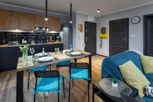 Kuchyň nebo kuchyňský kout v ubytování Apartament Gardenia No.1