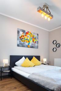 Postel nebo postele na pokoji v ubytování Apartament Gardenia No.1
