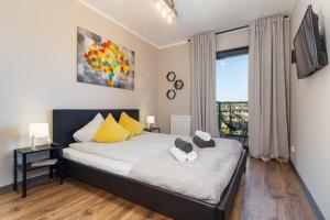 Postel nebo postele na pokoji v ubytování Apartament Gardenia No.1