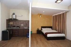 Postelja oz. postelje v sobi nastanitve Hotel Hema