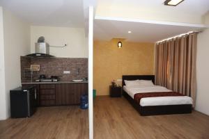 Postelja oz. postelje v sobi nastanitve Hotel Hema