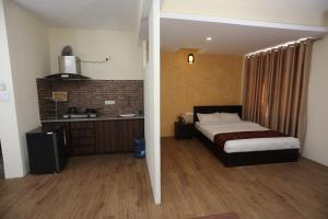 Postelja oz. postelje v sobi nastanitve Hotel Hema