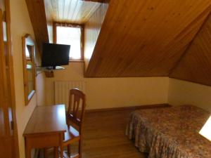 TV a/nebo společenská místnost v ubytování Hotel Las Nieves